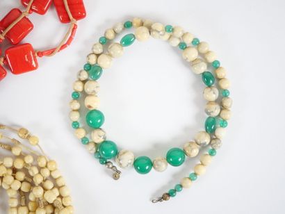 Set of four necklaces with pearls and costume...