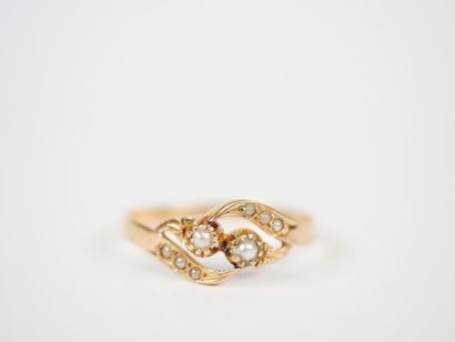 18K yellow gold ring decorated with stylized...