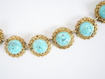 Gilded metal ensemble decorated with flowers...
