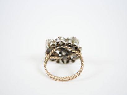 Silver and silver-gilt trembler ring decorated...