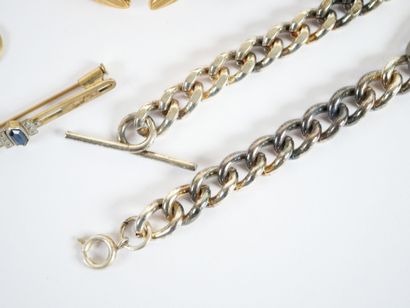 Costume jewelry set including: two silver...
