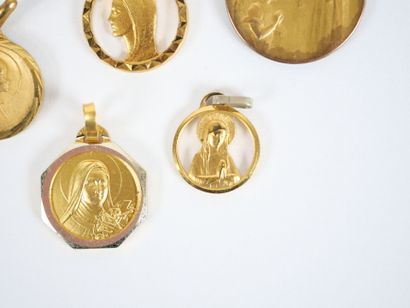 Set of 11 religious medals in gilt metal,...