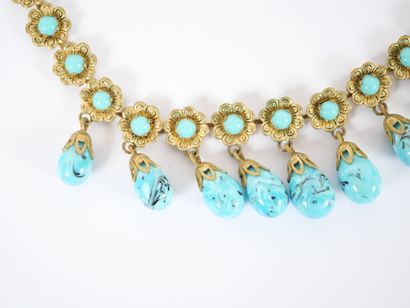 Gilded metal ensemble decorated with flowers...