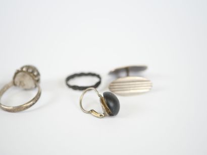 Set of three silver rings set with hard stones...