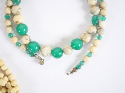 Set of four necklaces with pearls and costume...