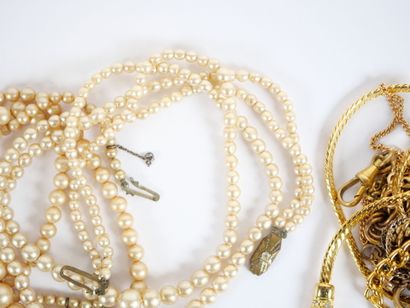 Costume jewelry set including: two silver...