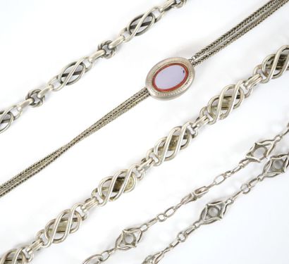 Set of three silver chatelaines.
A silver...