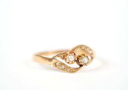 18K yellow gold ring decorated with stylized...