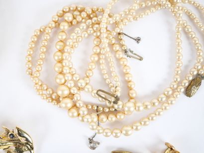 Costume jewelry set including: two silver...