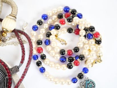 Set of nine fancy necklaces, including Lionheart...