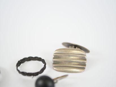 Set of three silver rings set with hard stones...