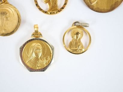 Set of 11 religious medals in gilt metal,...