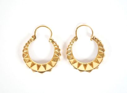 Pair of faceted hoop earrings in 18K yellow...