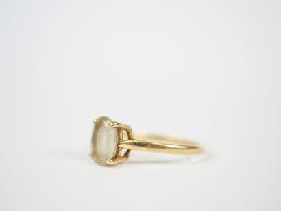 18K yellow gold ring set with a probable...