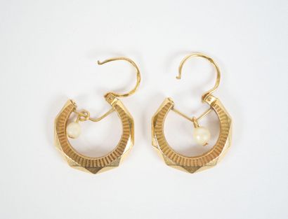 Pair of faceted hoop earrings in 18K yellow...
