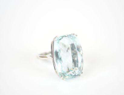 18K white gold ring set with a large faceted...
