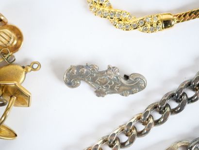 Costume jewelry set including: two silver...