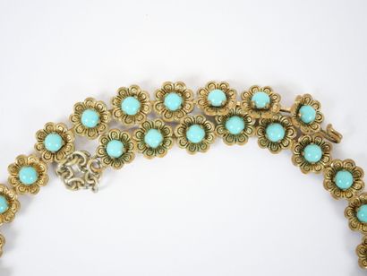 Gilded metal ensemble decorated with flowers...