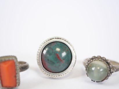 Set of three silver rings set with hard stones...