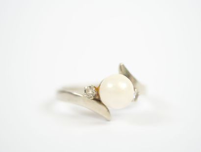 18K white gold or platinum ring centered...