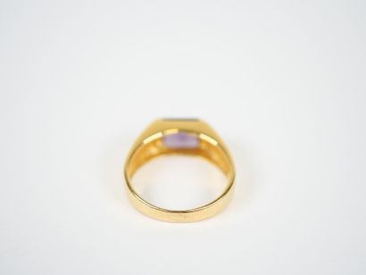 Large 18K yellow gold ring set with a square...