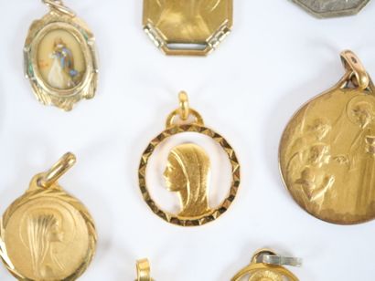 Set of 11 religious medals in gilt metal,...