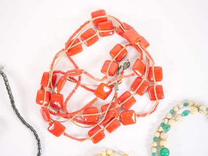 Set of four necklaces with pearls and costume...