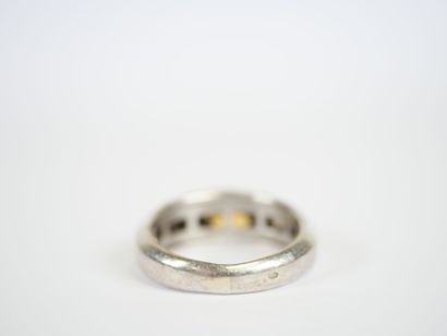18K white gold ring centered on a probable...