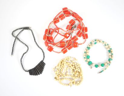Set of four necklaces with pearls and costume...