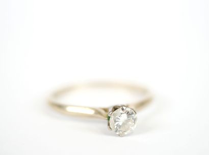 Solitaire ring in 18K white gold set with...