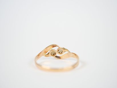 18K yellow gold ring decorated with stylized...