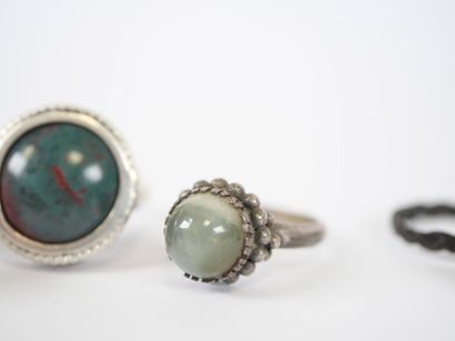 Set of three silver rings set with hard stones...