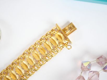 Costume jewelry set including: four necklaces,...