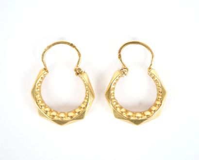 Pair of small faceted hoop earrings in 18K...