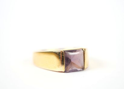 Large 18K yellow gold ring set with a square...
