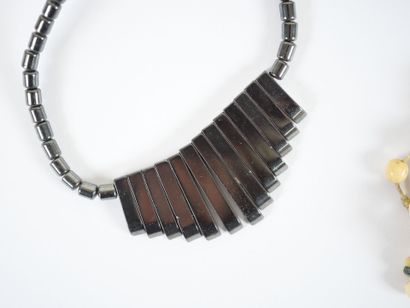 Set of four necklaces with pearls and costume...