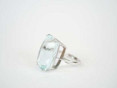 18K white gold ring set with a large faceted...