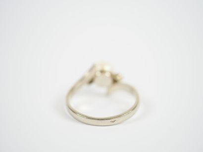 18K white gold or platinum ring centered...