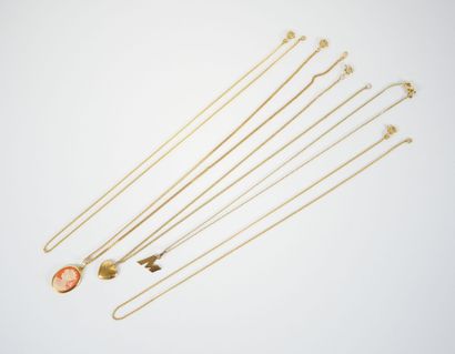 Set of five gilt metal neck chains, three...
