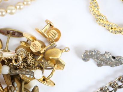 Costume jewelry set including: two silver...