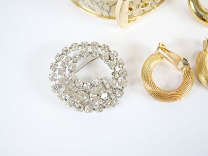 Costume jewelry set including: 
- Christian...