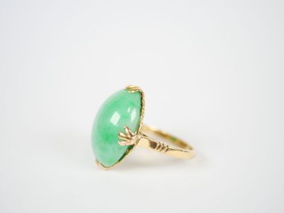 18K yellow gold ring set with a cabochon...