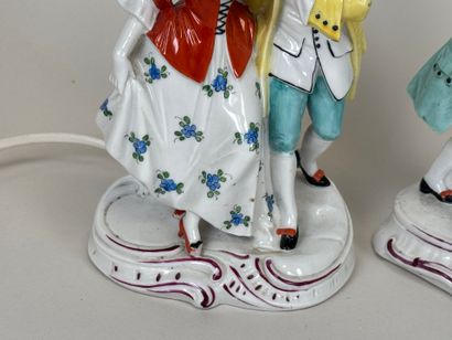 Pair of polychrome porcelain subjects with...
