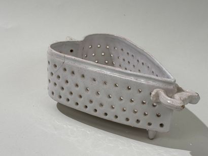 Openwork white earthenware cheese mold decorated...