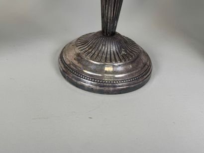 Lot including :
- a silver-plated candlestick...
