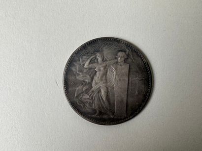 Médaille en argent.
D. 3,5 cm.