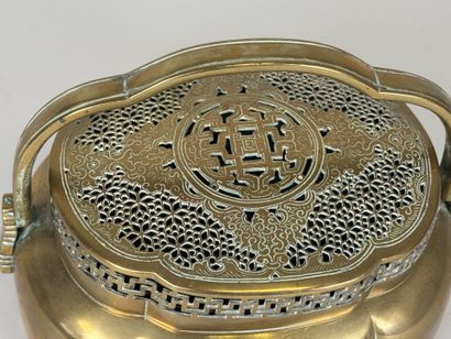 Indochina, 19th century.
Openwork brass incense...