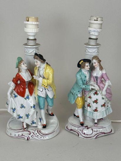 Pair of polychrome porcelain subjects with...