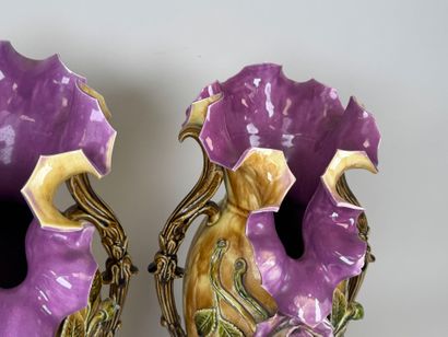 Pair of polychrome barbotine vases with two...