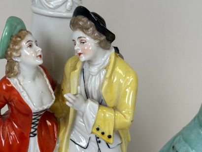 Pair of polychrome porcelain subjects with...